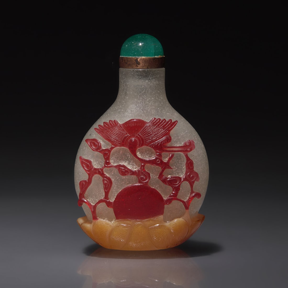 A Chinese Three-Color Overlay Snuff Bottle, Qing Dynasty, Daoguang Period, Circa 1821-1850 (1 of 2)