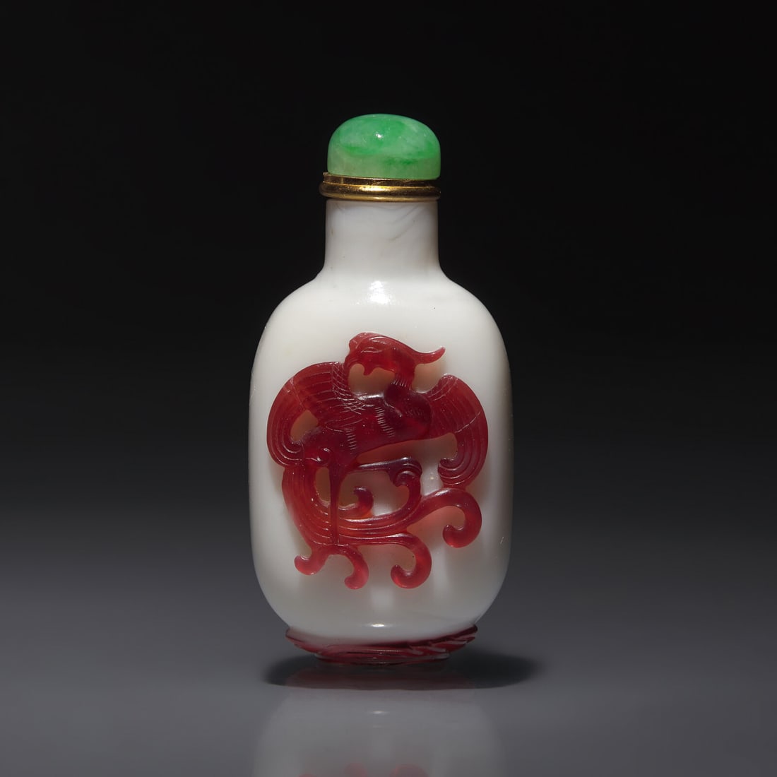 A Chinese Glass Overlay "Dragon and Phoenix" Snuff Bottle, Qing Dynasty, 18th Century (1 of 2)