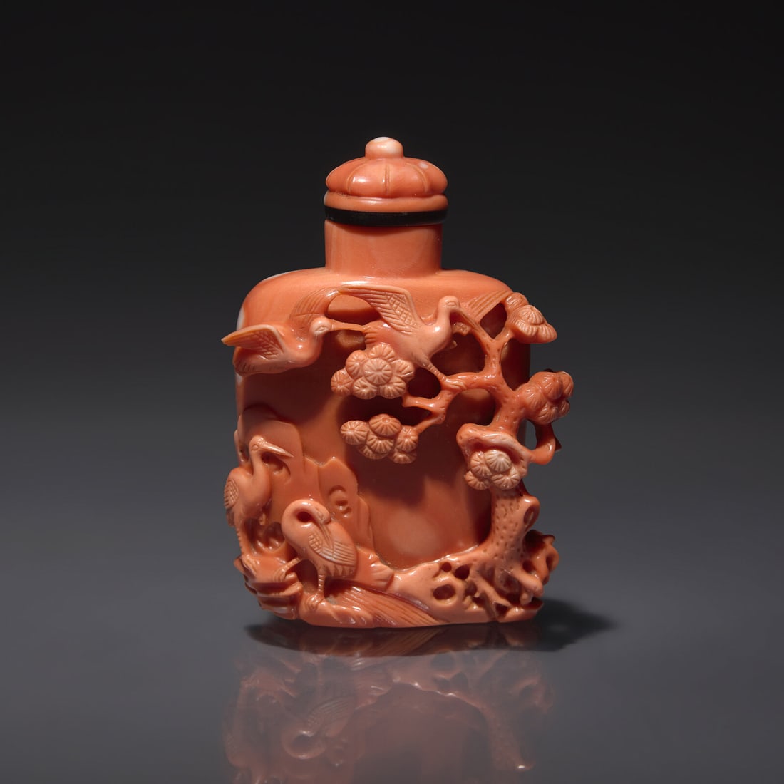 A Finely-Carved Coral Snuff Bottle, Guangxu Period (1 of 2)