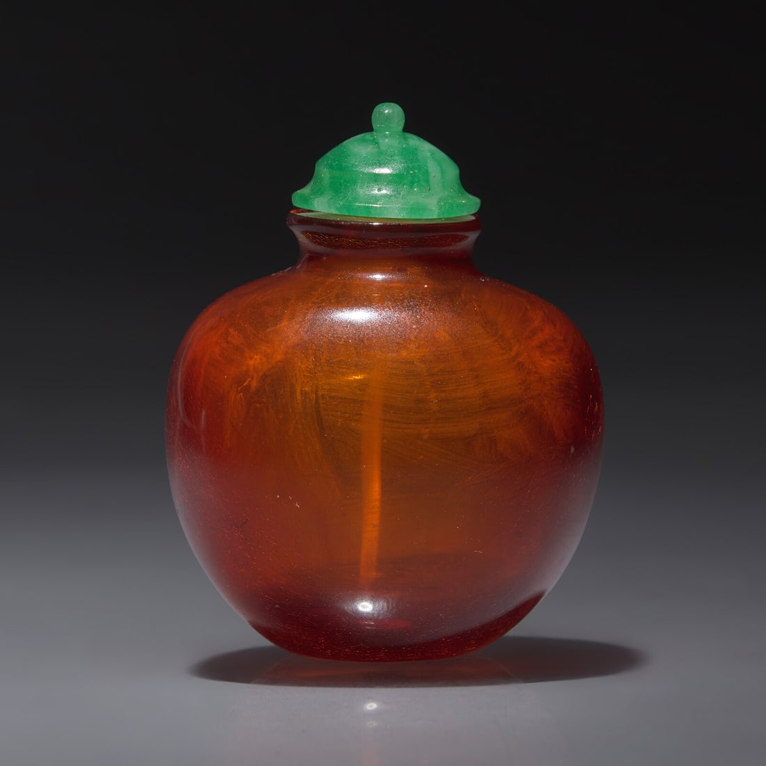 A Chinese Amber Snuff Bottle, Qing Dynasty, Circa 1740-1820 (1 of 2)
