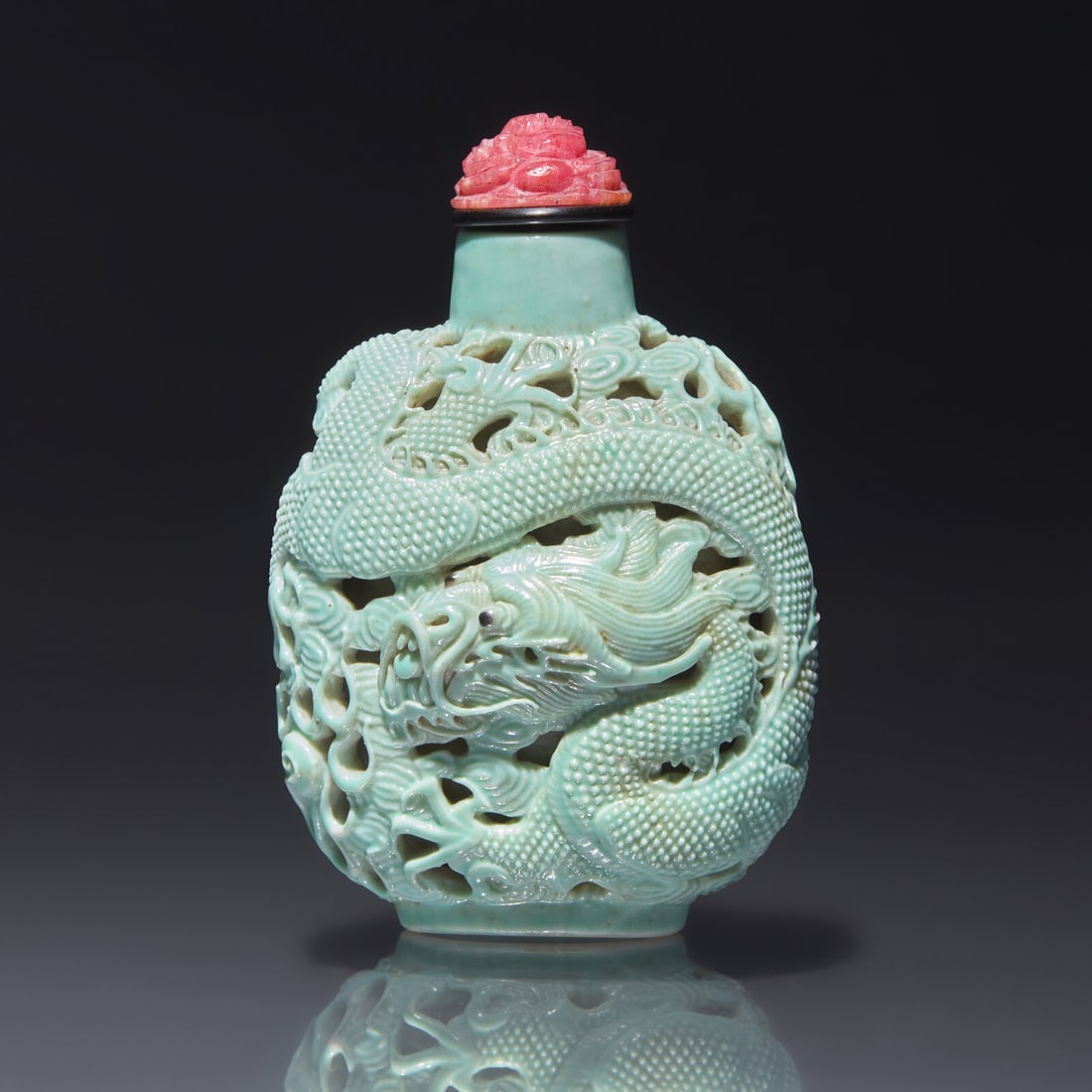 A Chinese Turquoise-Glazed Reticulated Porcelain "Dragon" Snuff Bottle, Qing Dynasty, Second Half (1 of 3)