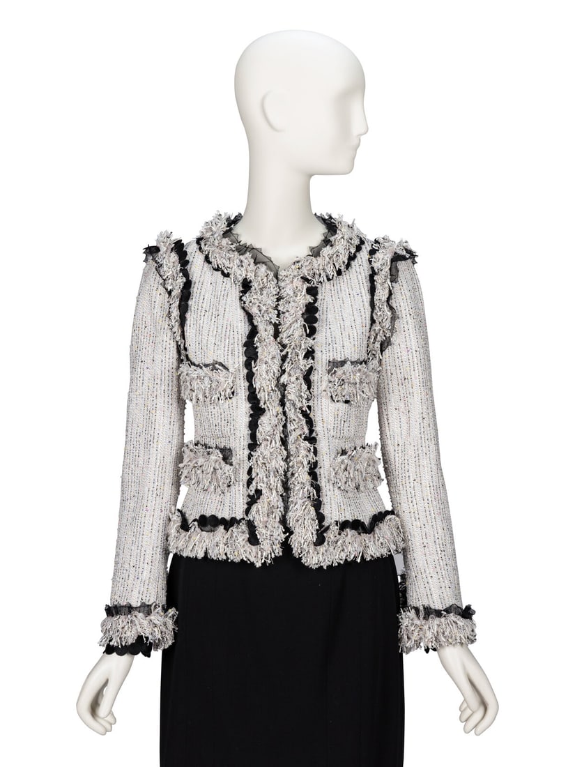 Chanel, Fringe Fantasy Tweed Jacket: Chanel, Fringe Fantasy Tweed Jacket As seen in runway look #13 of the Spring/Summer 2004 ready-to-wear collection by Karl Lagerfeld for Chanel. Cardigan jacket in black & white fantasy tweed with