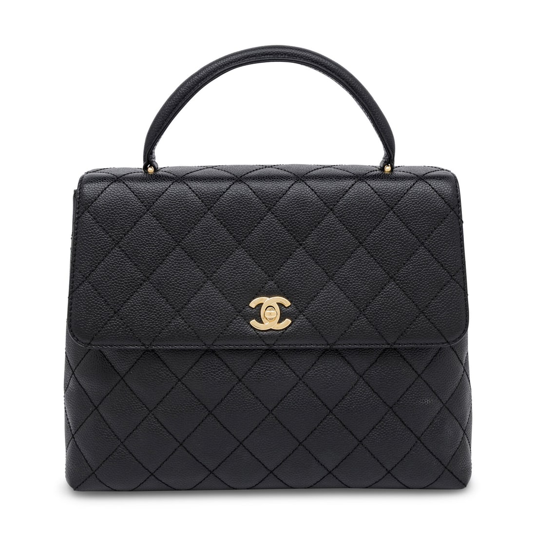 Chanel, Kelly Handle Bag in Black Caviar Leather: Chanel, Kelly Handle Bag in Black Caviar Leather Kelly handle bag in quilted black caviar leather with 24k gold-plated hardware. CC turn-lock closure and top handle. Label: Chanel Style/Serial No.: 77