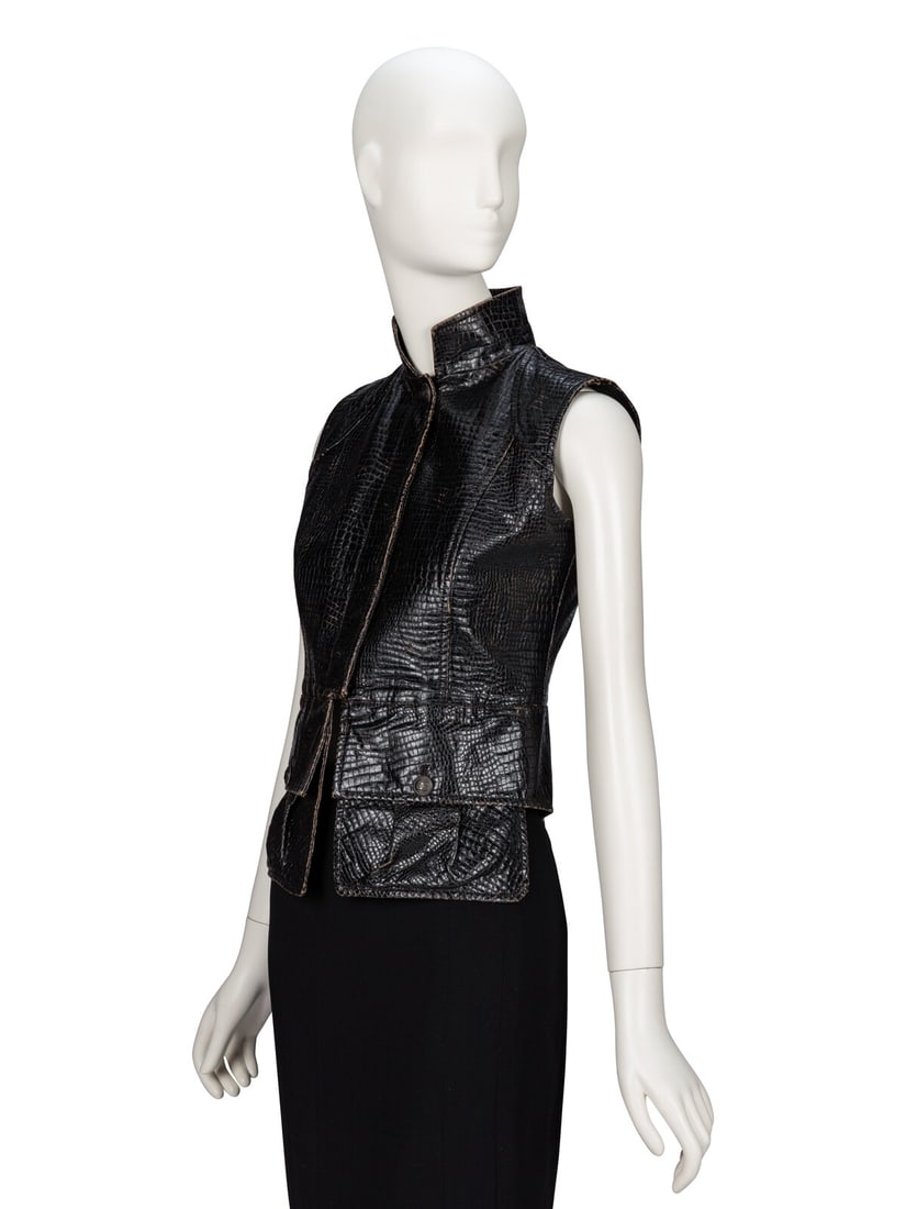 Chanel, Deep Brown Croc-Effect Gilet, F/W 2003: Chanel, Deep Brown Croc-Effect Gilet, F/W 2003 As seen in runway look #61 of the Fall/Winter 2003 ready-to-wear collection by Karl Lagerfeld for Chanel. Gilet in croc-embossed aged deep brown PU