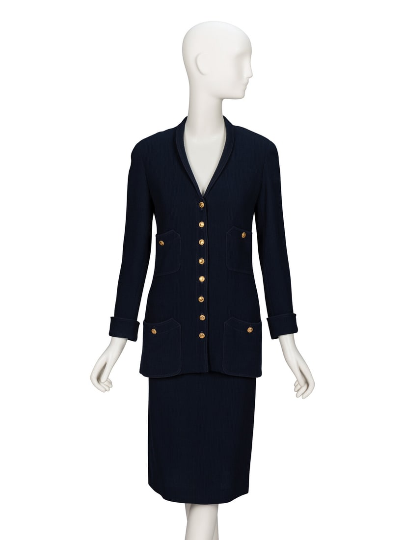 Chanel, Navy Cord Skirt Suit: Chanel, Navy Cord Skirt Suit JACKET Softly tailored cardigan jacket in a lightweight navy Bedford cord. Small shawl collar. Light padding at shoulders. Wrist-length sleeves working button cuff