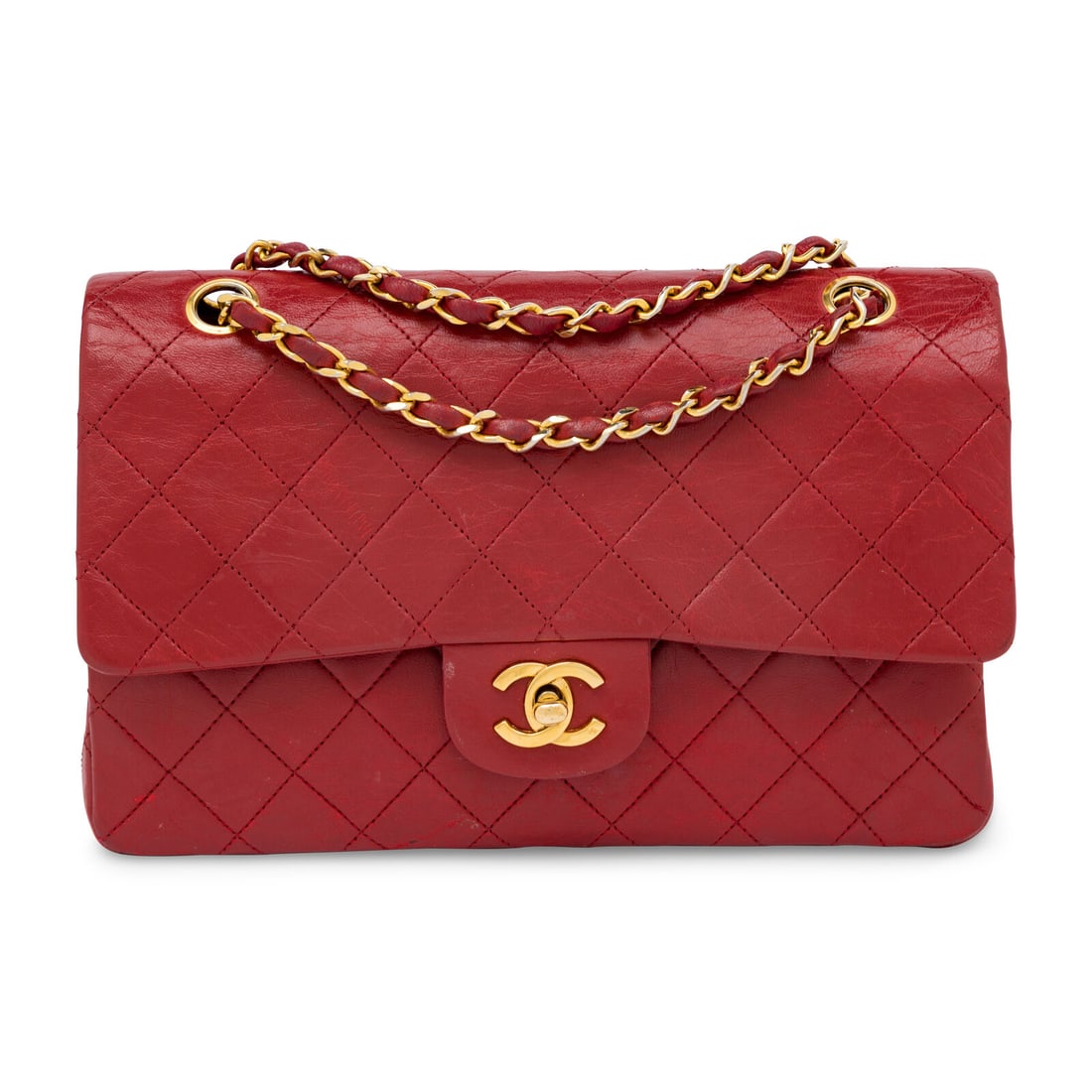 Chanel, Red Small Classic Double Flap Bag: Chanel, Red Small Classic Double Flap Bag Small classic double flap shoulder bag in crimson matelassÈ leather with 24k gold-plated hardware. CC turn-lock closure and interwoven metal-leather