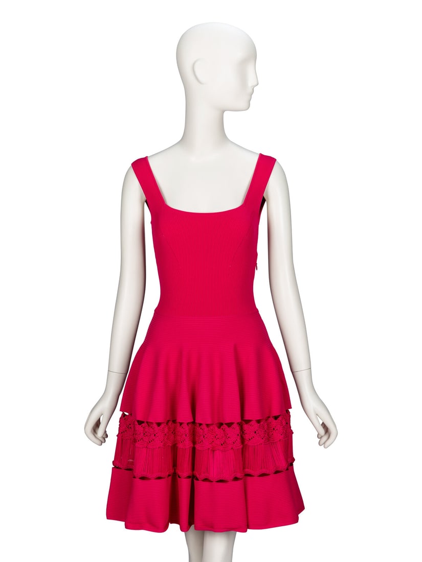 Alexander McQueen, Hot Pink Knit Dress: Alexander McQueen, Hot Pink Knit Dress Sleeveless dress in hot pink stretch-blend viscose ribbed knit. High stretch content. Square neckline and fitted bodice. Knee-length flared circle skirt; with