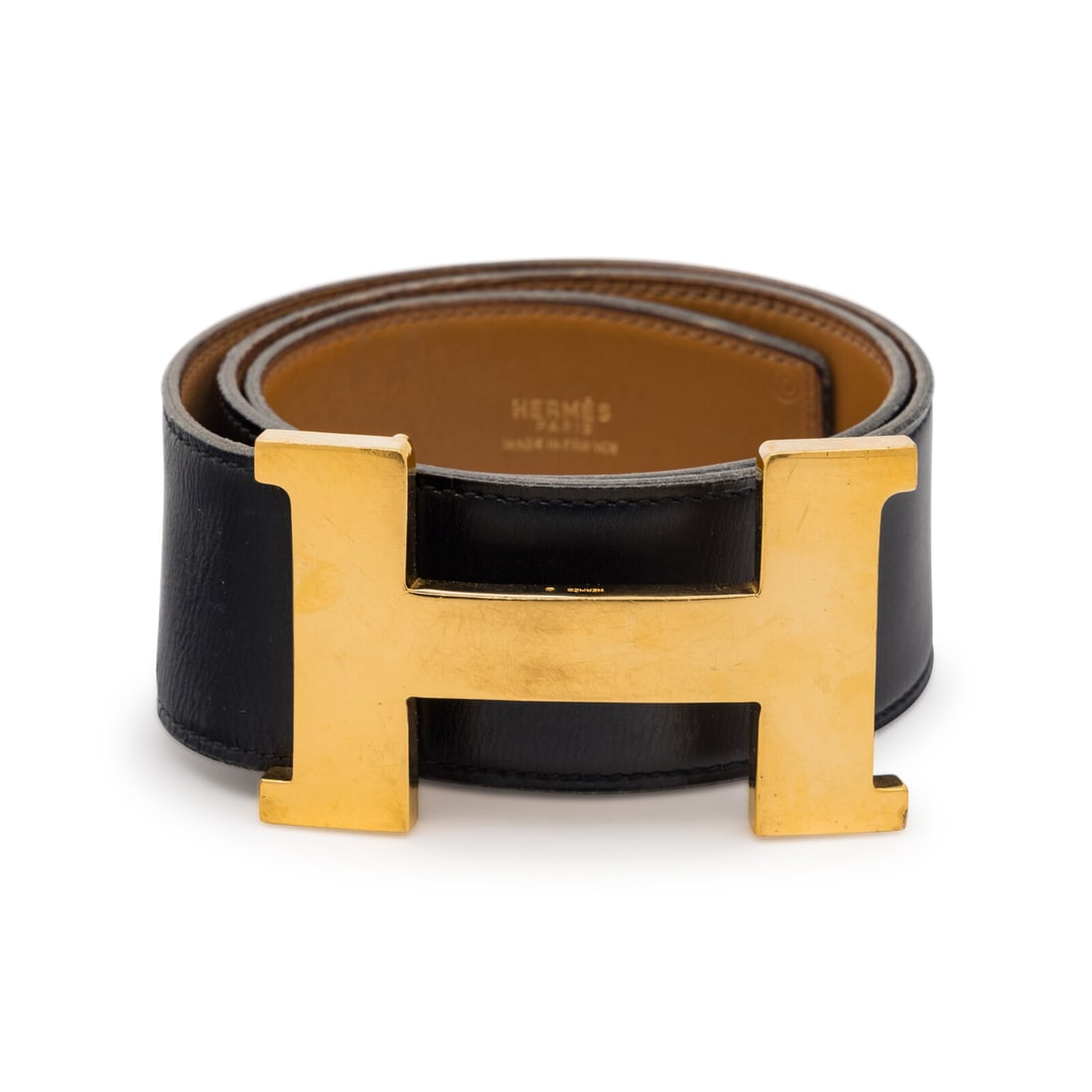Hermès, Constance Belt with Large Buckle, 1974: Hermès, Constance Belt with Large Buckle, 1974 Large Constance belt in black leather with a gold plated H buckle. Label: Hermès Stamp: D in Circle Date: 1974 Country of Origin: France Approximate
