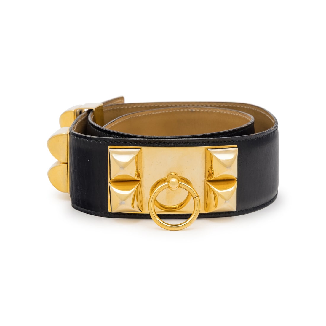 Hermès, Collier de Chien Belt: Hermès, Collier de Chien Belt Collier de Chien belt in black leather with gold-plated studded hardware. Tan leather lining. Label: Hermès Size Label: 70 Date: Mid-to-Late 20th Century Country of