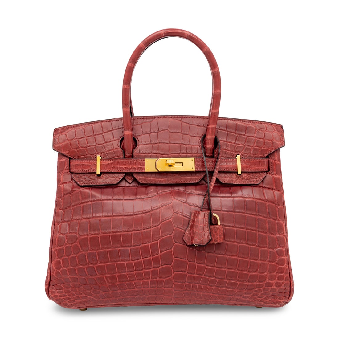 Hermès, Birkin 30 in Burgundy Crocodile: Hermès, Birkin 30 in Burgundy Crocodile Birkin 30 bag in Burgundy Niloticus Crocodile skin with gold-plated hardware. Label: Hermès Stamp: F in Square Date: 2002 Country of Origin: France