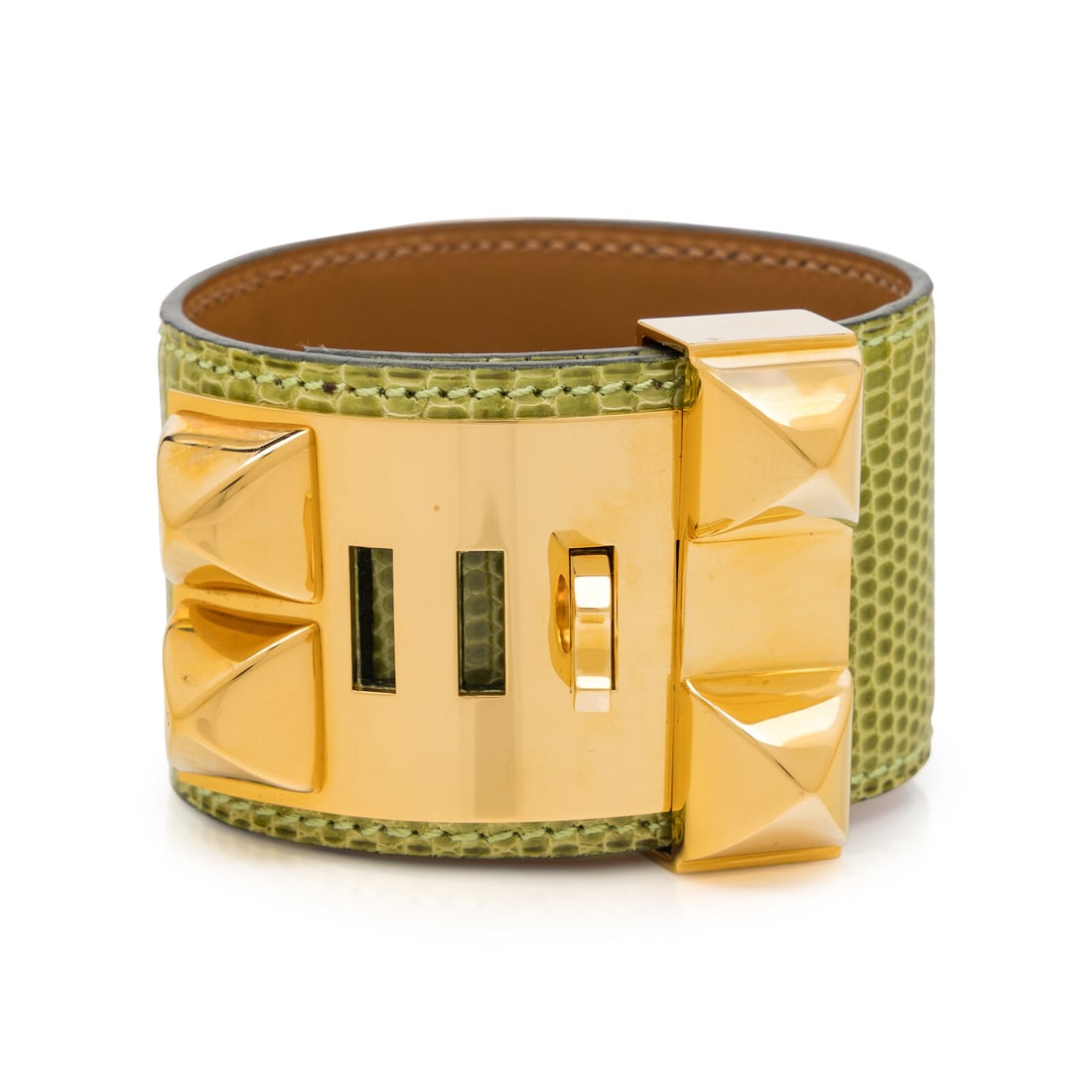Hermès, Collier de Chien Bracelet in Light Green Lizard: Hermès, Collier de Chien Bracelet in Light Green Lizard Collier de Chien bracelet in light green Varanus Niloticus lizard skin with gold-plated hardware, lined in brown leather. Features medor