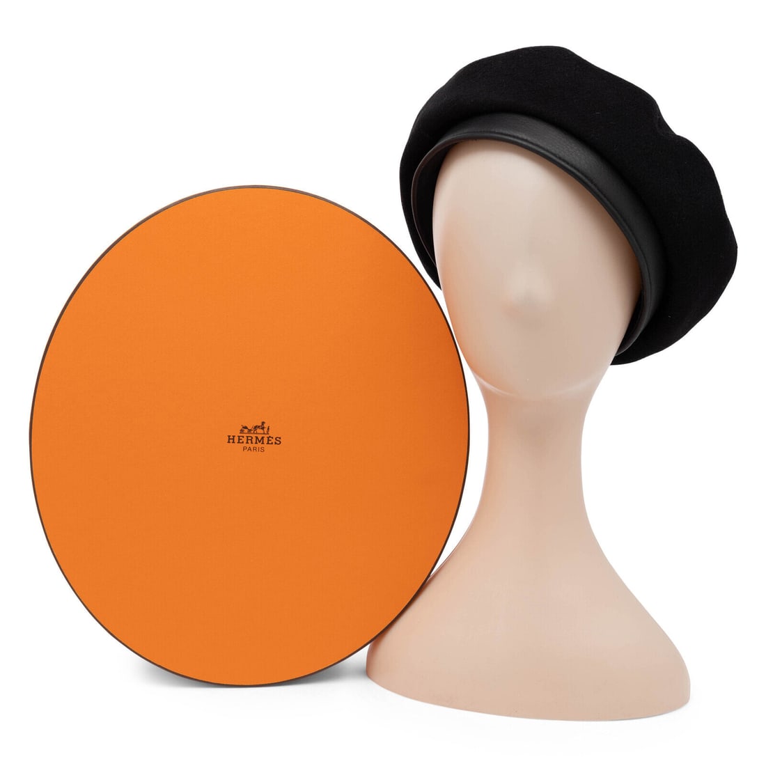 Hermès, Black Cashmere & Leather Beret: Hermès, Black Cashmere & Leather Beret Beret in black cashmere felt with a black leather brim. Fully lined; with petersham brim interior. Label: Hermès Size Label: 58 Date: Early 21st Century
