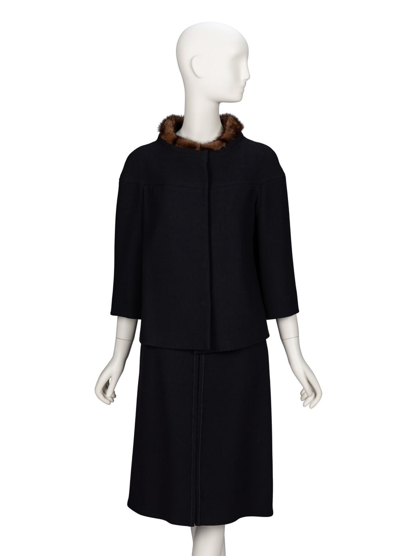 Prada, Mink-Collar Skirt Suit: Prada, Mink-Collar Skirt Suit JACKET A-line swing jacket in black wool crÍpe with brown mink fur collar. Round neckline. Rounded shoulder yoke. Three-quarter-length sleeves. Concealed