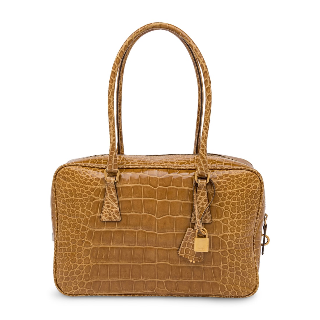 Prada, Tan Crocodile Handbag: Prada, Tan Crocodile Handbag Handbag in tan glossy crocodile skin with brushed gold-tone hardware. Zipper closure and rolled handles. Label: Prada Date: 2000's Country of Origin: Italy Approximate