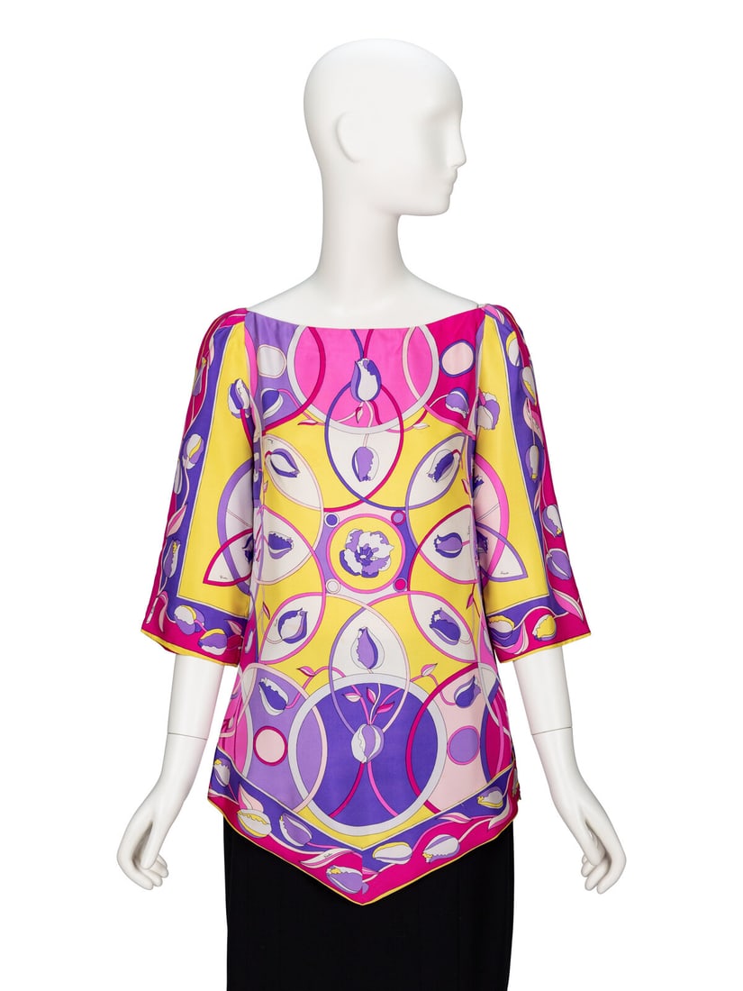 Emilio Pucci, Printed Silk Tunic Blouse: Emilio Pucci, Printed Silk Tunic Blouse Tunic blouse in multicolor floral-print silk twill. Wide bateau neckline. Elbow-length sleeves. Slight A-line silhouette to bodice with V-shaped hemline.