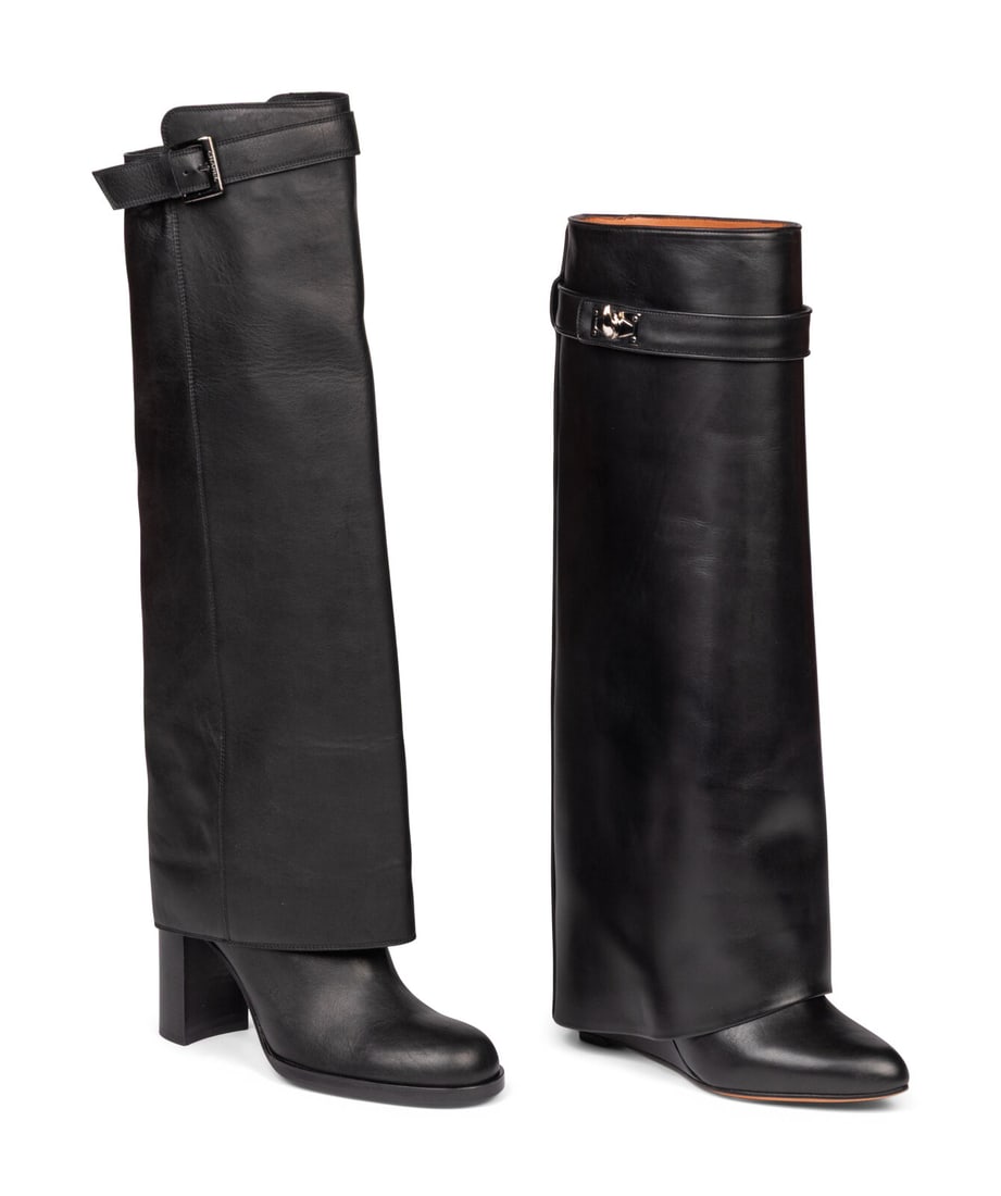 Chanel & Givenchy, Two Pairs of Leather Boots: Chanel & Givenchy, Two Pairs of Leather Boots THE FIRST Knee-high heeled boot in black leather with wide fold-over shaft. Features a block heel and adjustable buckle strap at the top. Label: Chanel Si