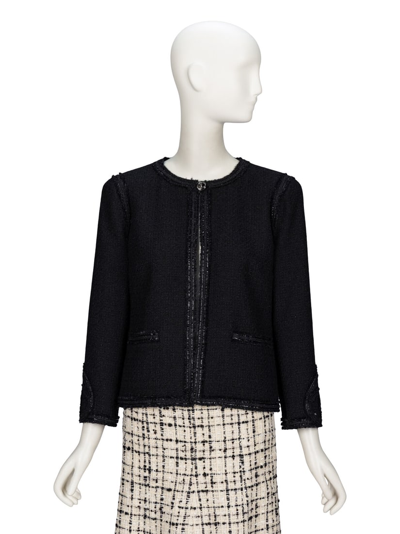 Chanel, Black Tweed Cardigan Jacket: Chanel, Black Tweed Cardigan Jacket Cardigan jacket in black wool-blend bouclÈ tweed with frayed & lamÈ trim throughout. Round collarless neckline. Wrist-length set-in sleeves. Two welt