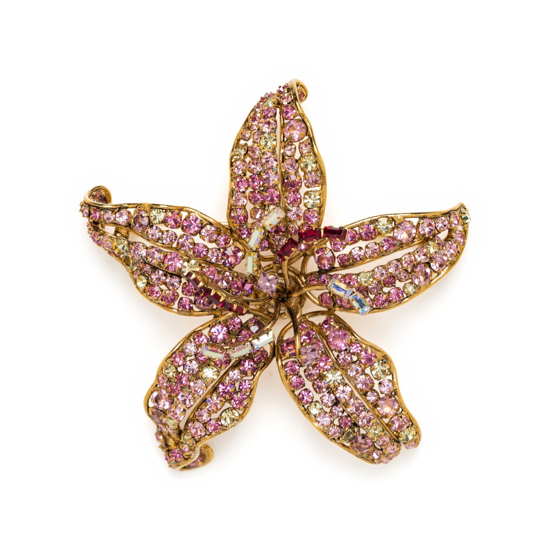 Iradj Moini, Rhinestone Lily Brooch: Iradj Moini, Rhinestone Lily Brooch Gold-tone lily brooch set with yellow and pink rhinestones, with dimensional pistil and stamens, set with pink, red and white emerald-cut rhinestones. Label: Iradj