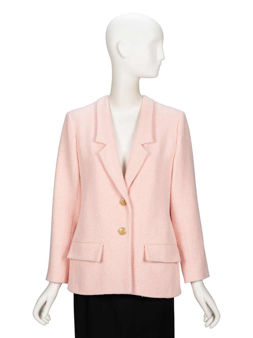 Chanel, Pink Cotton Tweed Jacket: Chanel, Pink Cotton Tweed Jacket Softly tailored jacket in pale pink cotton-blend tweed. Low-notched lapels. Light padding at shoulders. Full-length set-in sleeves with working button closures at cuff