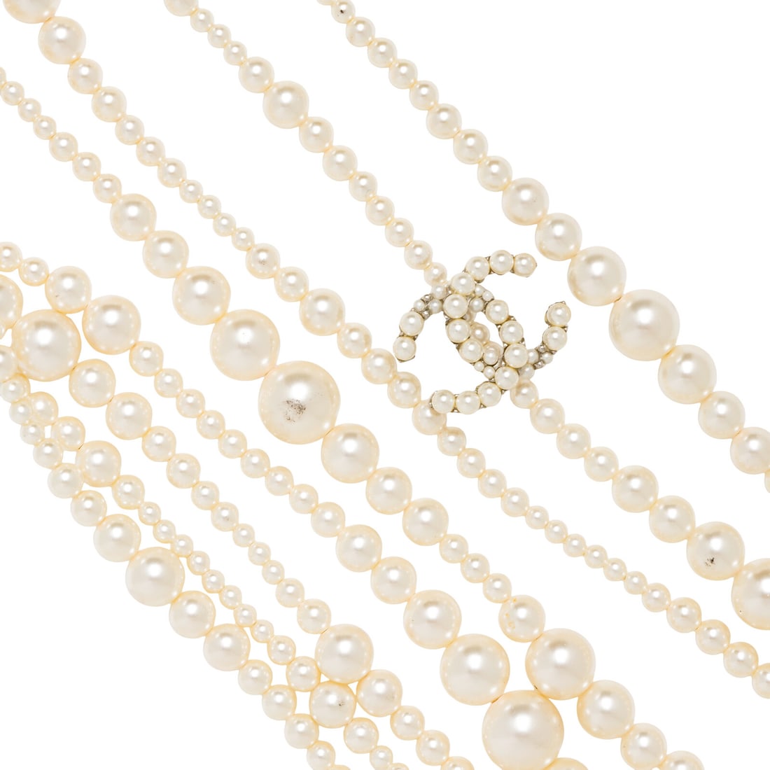 Chanel, Multi-Strand Gripoix Pearl Sautoir: Chanel, Multi-Strand Gripoix Pearl Sautoir Multi-strand layered sautoir necklace in white Gripoix pearl beads of varying sizes and silver-tone metal. Features pearl-studded CC insignia and knotted