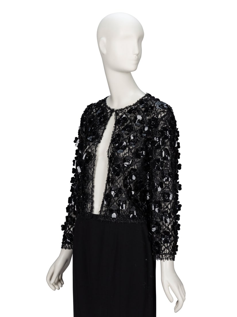 Oscar de la Renta, Black Embellished Jacket: Oscar de la Renta, Black Embellished Jacket Cardigan jacket in black lace with black bead & black plastic flower embellishments throughout. Some stretch content. Round collarless neckline.