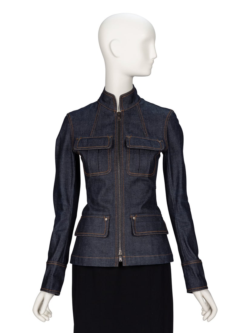 Yves Saint Laurent Rive Gauche, Fitted Denim Jacket: Yves Saint Laurent Rive Gauche, Fitted Denim Jacket Fitted jacket in indigo cotton denim. Stand collar. Full-length slim-cut sleeves with exposed zipper closures at sleeve hems. Four welt pockets with