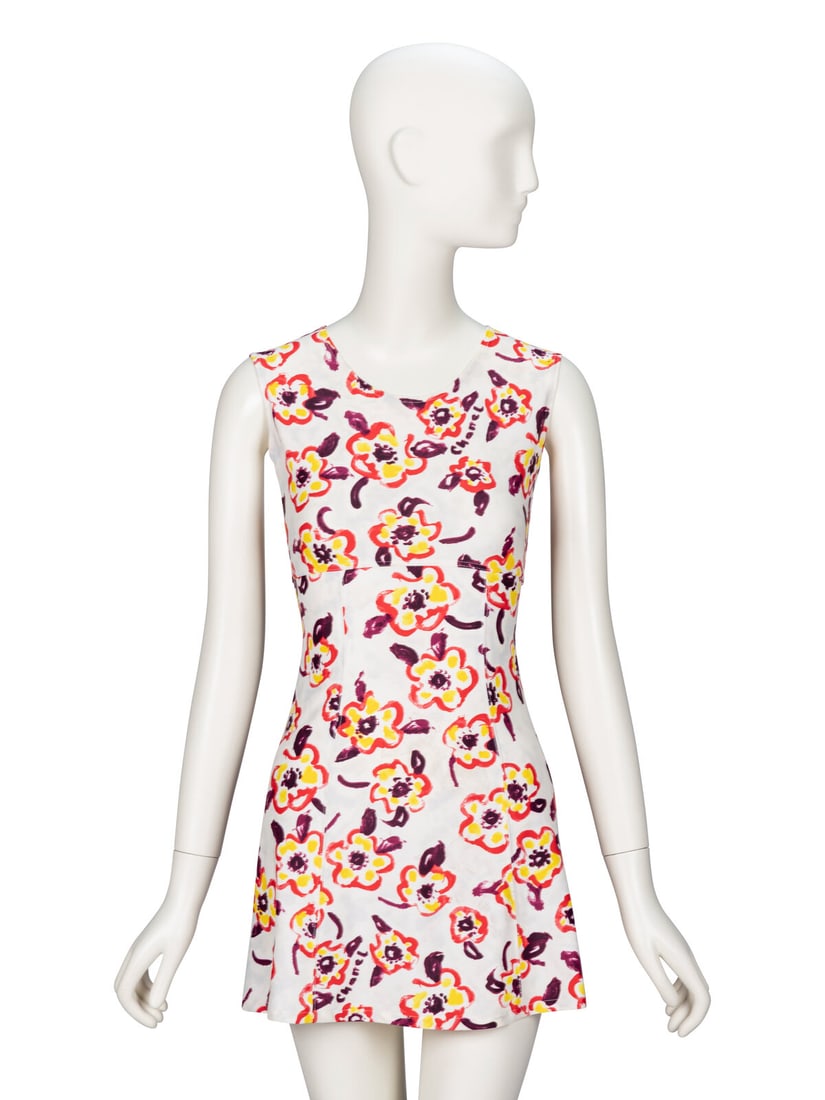 Chanel, Floral-Print Dress: Chanel, Floral-Print Dress Sleeveless sheath dress in a painted floral-print stretch-blend knit. Round collarless neckline. Fitted bodice. Knee-length A-line skirt. No closures. Unlined. Label: Chanel