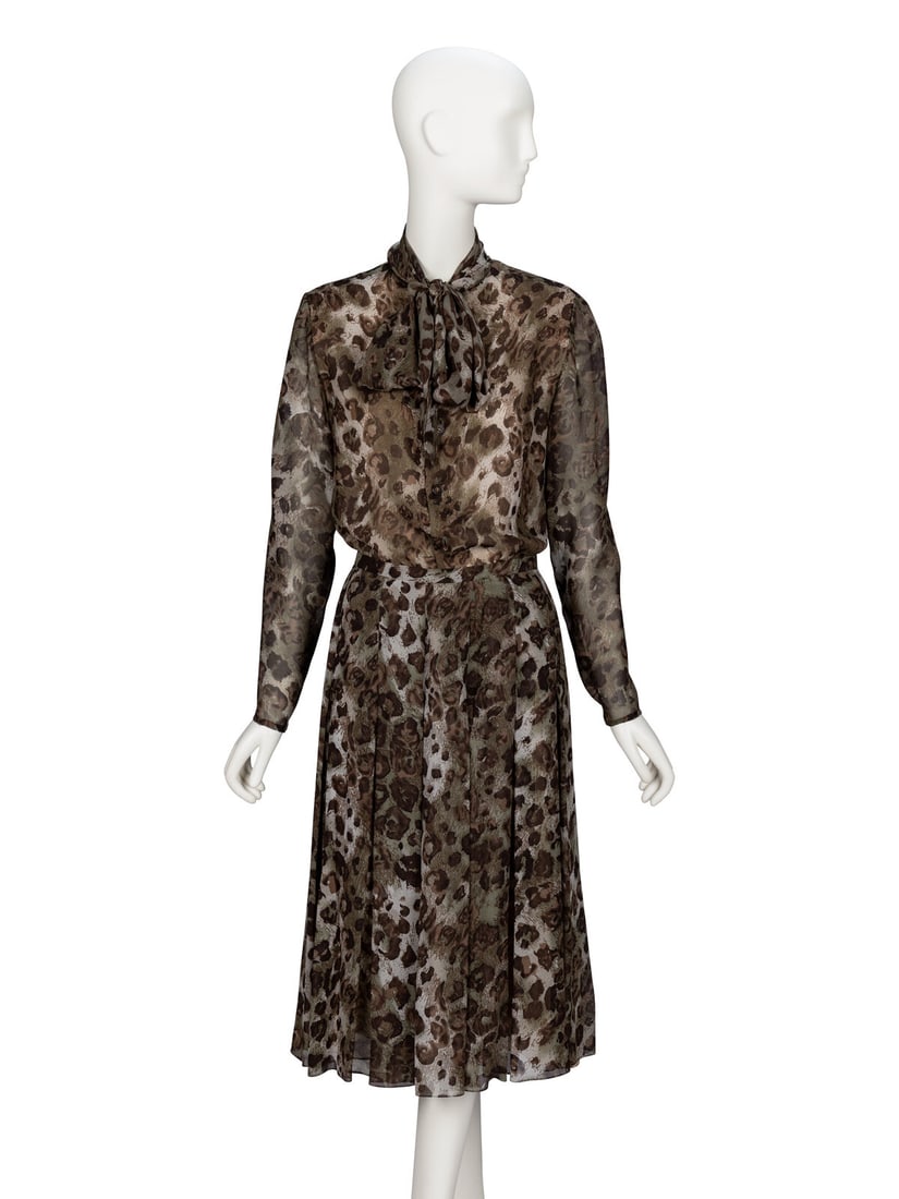 Bill Blass, Leopard-Print Chiffon Skirt Ensemble: Bill Blass, Leopard-Print Chiffon Skirt Ensemble BLOUSE Lavaliere blouse in olive green & brown leopard-print chiffon. Straight-cut bodice. Round neckline with attached Padding at shoulders.