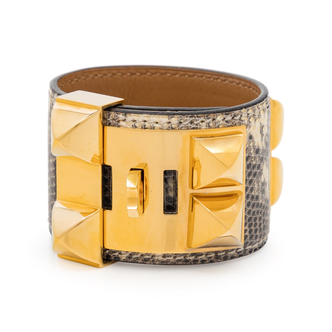 Hermès, Collier de Chien Bracelet in Salvator Lizard: Hermès, Collier de Chien Bracelet in Salvator Lizard 'Collier de chien' cuff bracelet in Varanus Salvator lizard skin with gold-plated hardware, lined in brown leather. Features medor studs, ring,