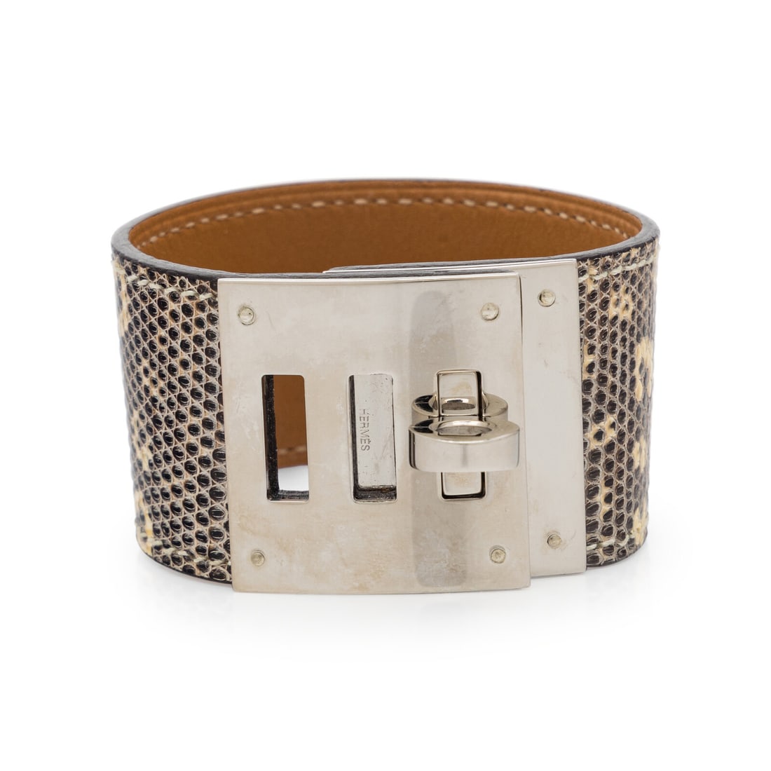 Hermès, Kelly Dog Bracelet in Salvator Lizard: Hermès, Kelly Dog Bracelet in Salvator Lizard Kelly Dog bracelet in Varanus Salvator lizard skin with palladium-plated hardware. Lined in brown leather. Turn-lock clasp closure. Label: Hermès