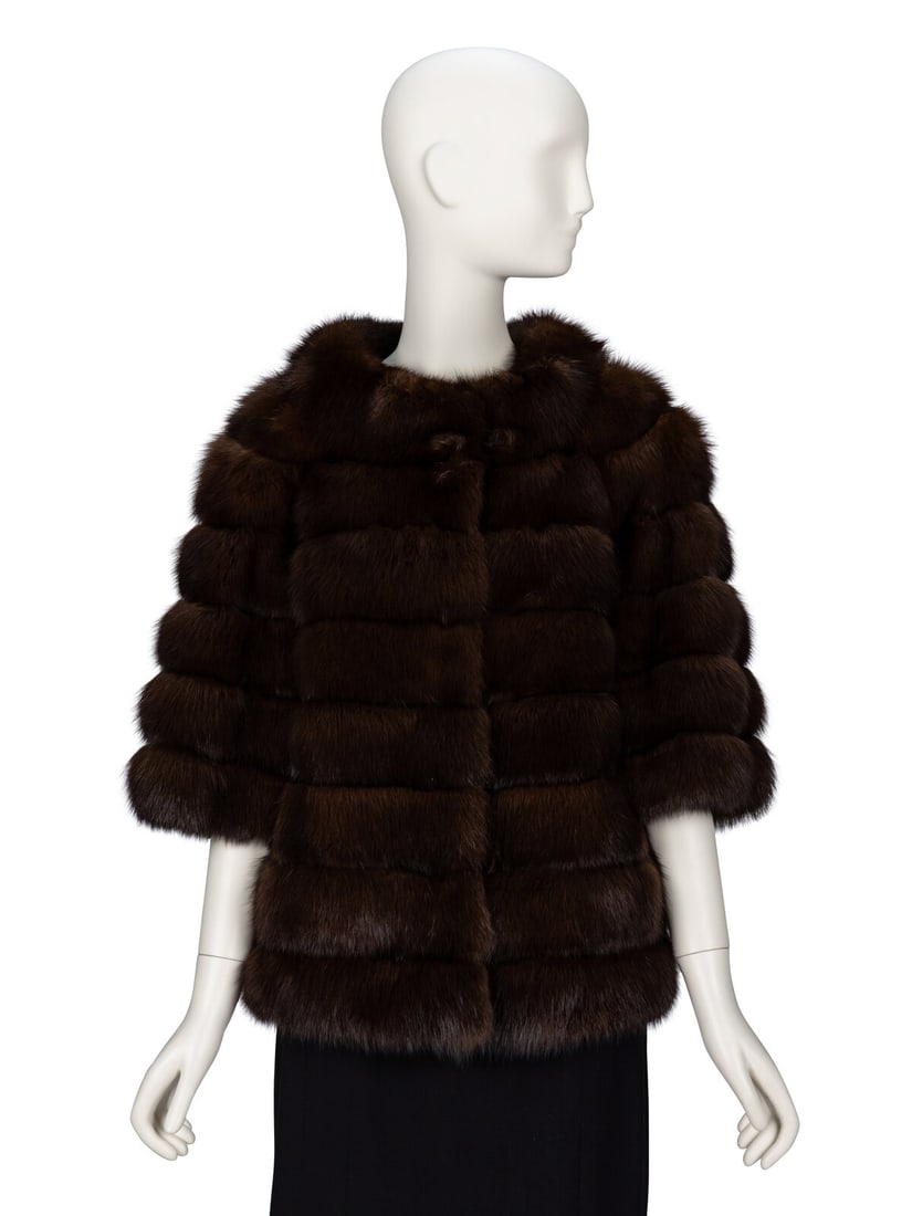 Zandra Rhodes, Russian Sable Fur Short Jacket: Zandra Rhodes, Russian Sable Fur Short Jacket Hip-length jacket in Russian brown sable fur. Wide stand collar. Wide elbow-length sleeves. Two slit pockets at front. Three fabric-covered snap