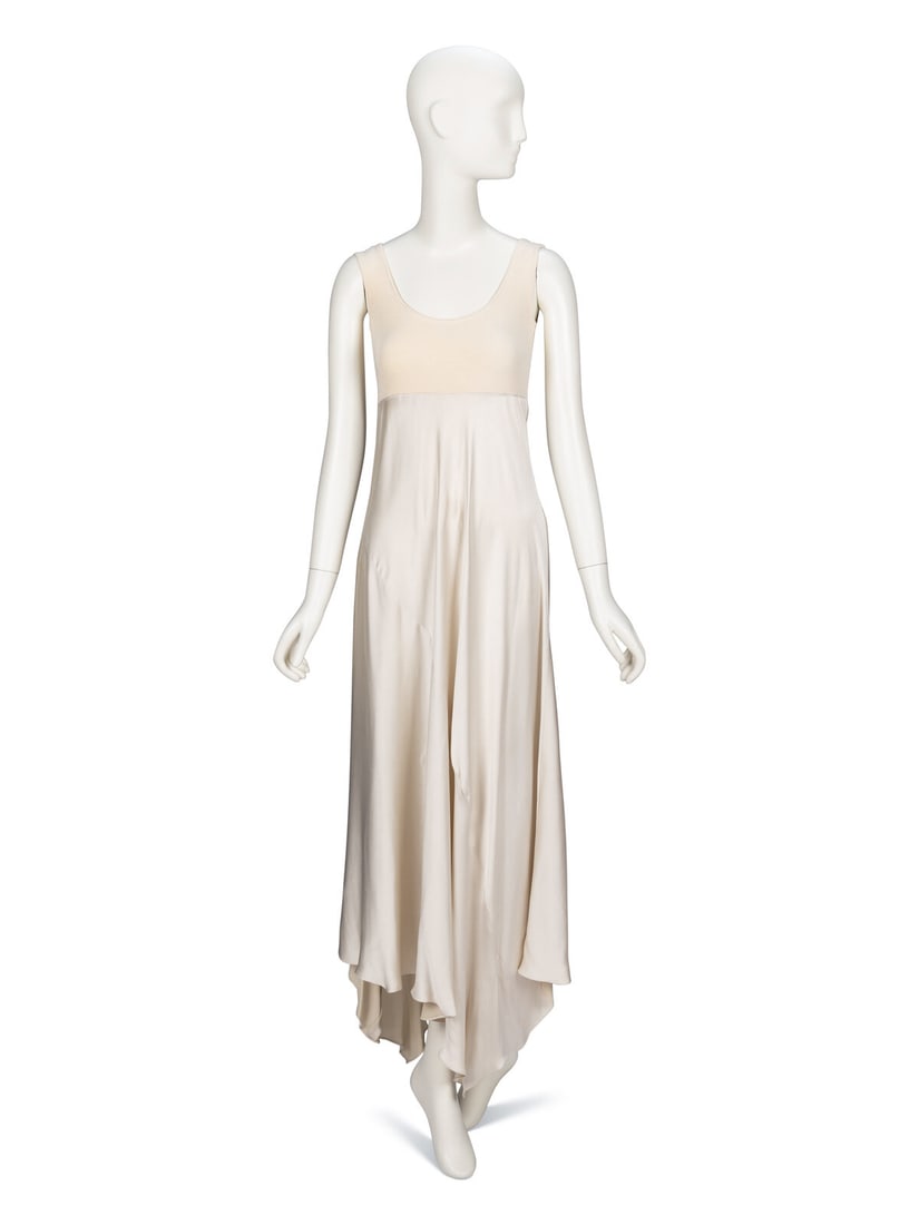 Donna Karan, Bias Cut Tank Dress, Original Sample: Donna Karan, Bias Cut Tank Dress, Original Sample Tank dress in cream jersey knit with an ivory charmeuse skirt. Scoop neckline. Empire waistline. Bias-cut, spiral-paneled ankle length skirt with a