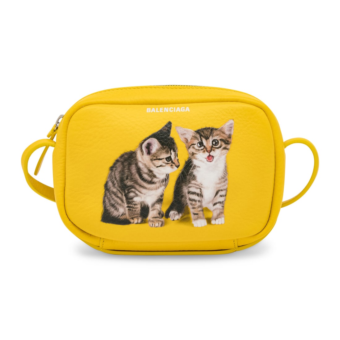 Balenciaga, Kittens XS Crossbody Bag: Balenciaga, Kittens XS Crossbody Bag Everyday XS Camera Crossbody bag in grained yellow leather with painted cat graphics at front. Zipper closure and adjustable flat leather strap. Label: Balenciaga