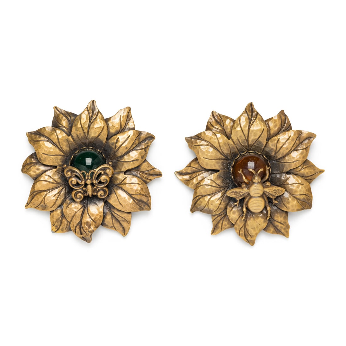 Joseph of Hollywood, Two Costume Flower Brooches: Joseph of Hollywood, Two Costume Flower Brooches Hammered gold-tone metal flower brooches, one having a central green cabochon and a butterfly, the second with an orange cabochon and bee. Label: