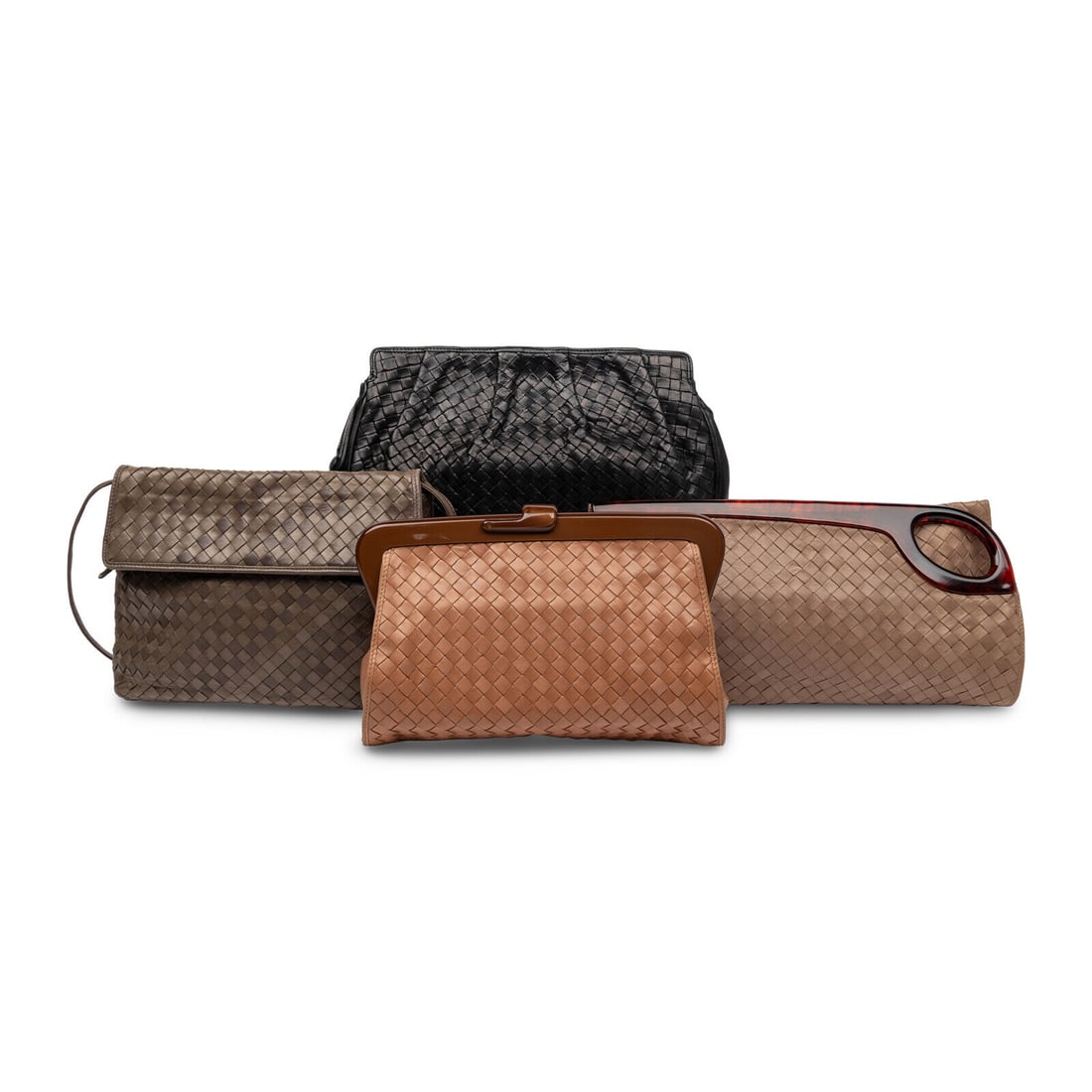 Bottega Veneta, Four Intrecciato Leather Handbags: Bottega Veneta, Four Intrecciato Leather Handbags THE FIRST Clutch in black intrecciato woven lambskin leather. Zipper closure. Label: Bottega Veneta Date: Late 20th Century Country of Origin: Italy
