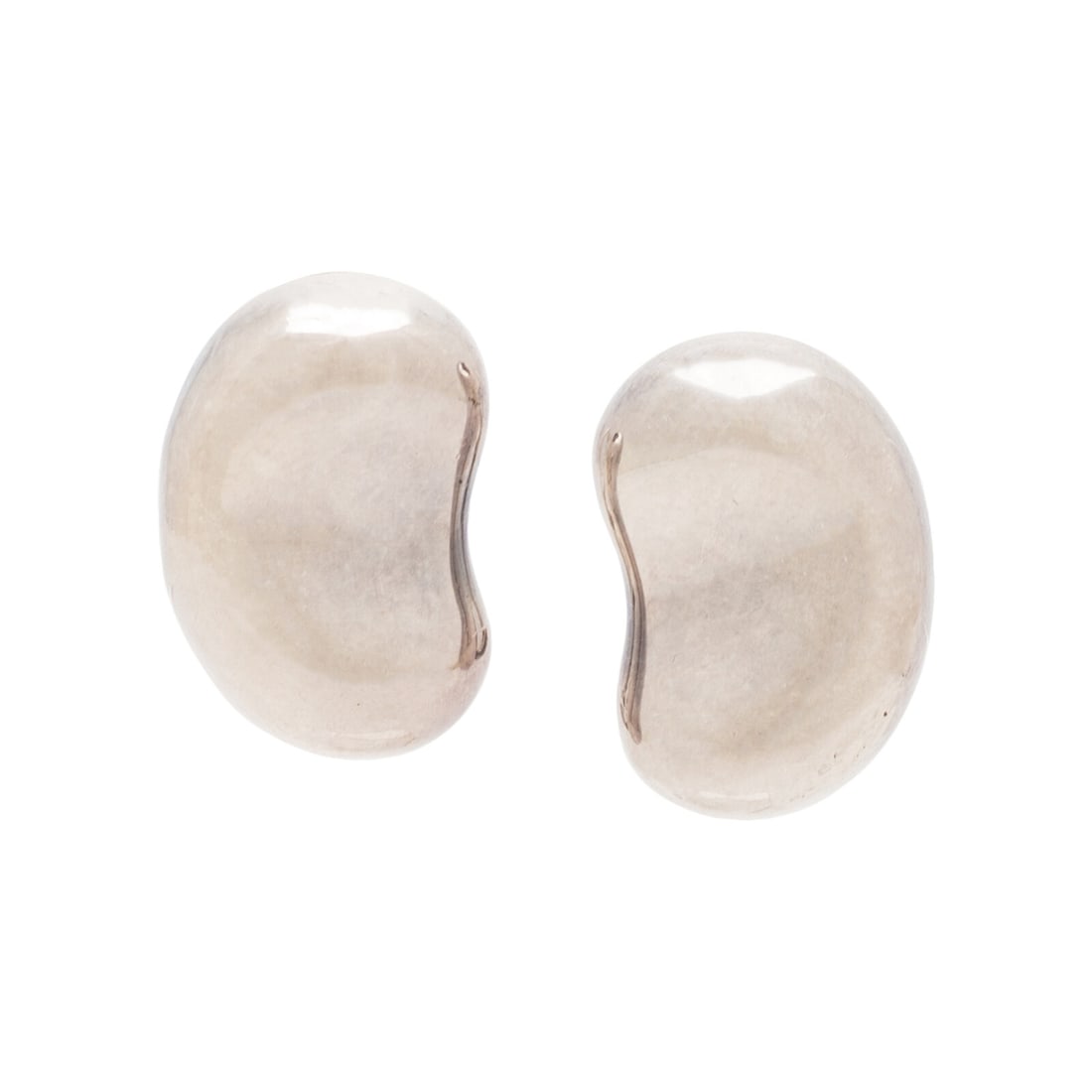 Tiffany & Co., Elsa Peretti; Silver Bean Ear Clips: Tiffany & Co., Elsa Peretti; Silver Bean Ear Clips Pair of bean design ear clips in sterling silver. Standard clip backs. Includes dust bag. Stamp: TIFFANY & CO. / Elsa Peretti / 925 Gross Weight: