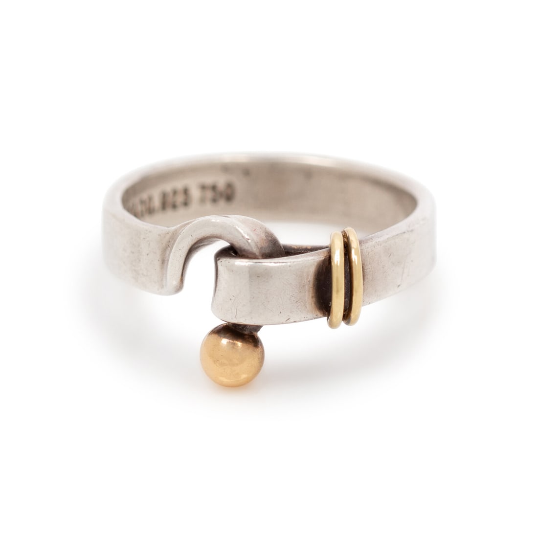 Tiffany & Co., Silver & Gold Ring: Tiffany & Co., Silver & Gold Ring Ring in sterling silver and 18k gold. Size is approximately 7-7.5. Stamped "TIFFANY & CO. / 925/ 750" at interior. Label: Tiffany & Co. This lot is located in
