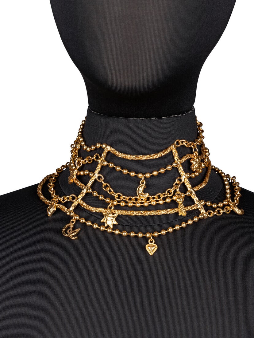 Christian Lacroix, Charm Collar Necklace: Christian Lacroix, Charm Collar Necklace Tall collar necklace in gold-tone metal. Comprised of strands of beads and chains with variety of dangling charms throughout. Toggle closure. Includes box. Lab