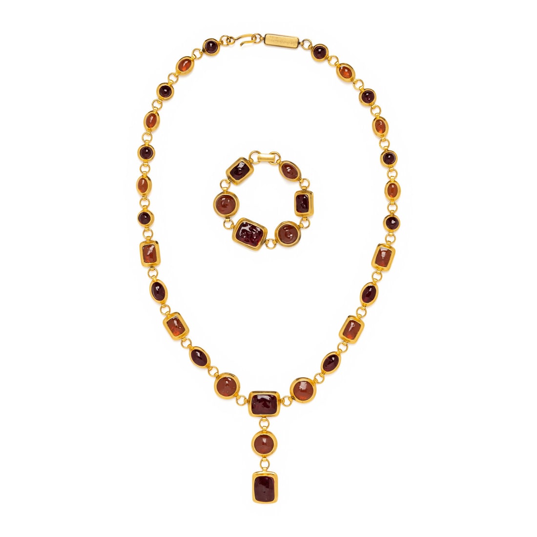 Yves Saint Laurent by Robert Goossens, Sautoir Necklace and Bracelet, 1980's: Yves Saint Laurent by Robert Goossens, Sautoir Necklace and Bracelet, 1980's Matching necklace and bracelet set with crimson red and orange poured resin textured cabochons in gold-tone settings. Neckl
