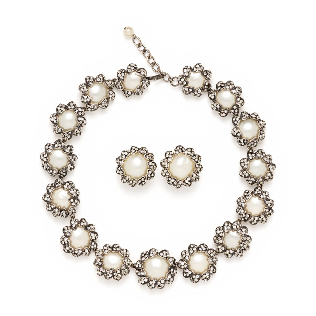 Chanel, Gripoix Pearl & Rhinestone Necklace and Ear Clips: Chanel, Gripoix Pearl & Rhinestone Necklace and Ear Clips Consisting of a necklace and matching ear clips, with large Gripoix pearls in floral rhinestone settings and silver-tone hardware. Includes