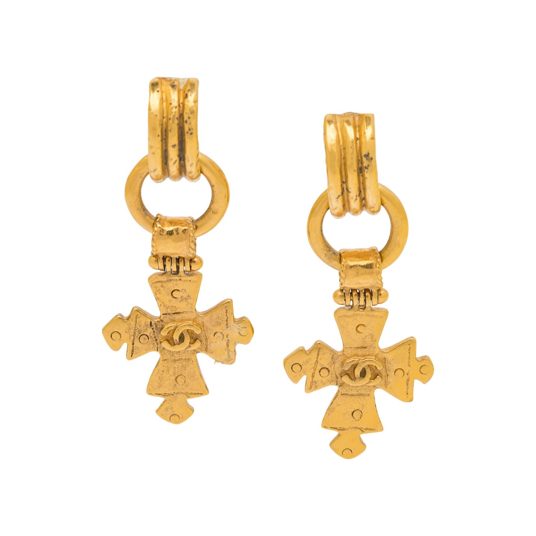 Chanel, Dangling Byzantine Cross Ear Clips: Chanel, Dangling Byzantine Cross Ear Clips Pair of ear clips in gold-tone metal with dangling Byzantine-style cross charms. Standard clip backs. Label: Chanel Date: S/S 1994 Country of Origin: France