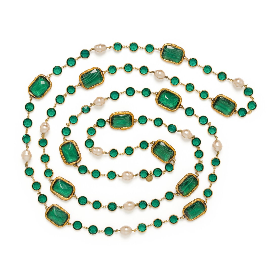Chanel, Green Glass Oversized Sautoir, 1981: Chanel, Green Glass Oversized Sautoir, 1981 Long sautoir necklace in gold-tone metal with green glass faceted beads, oversized rectangular striated glass chiclet beads, and Gripoix pearl beads. No