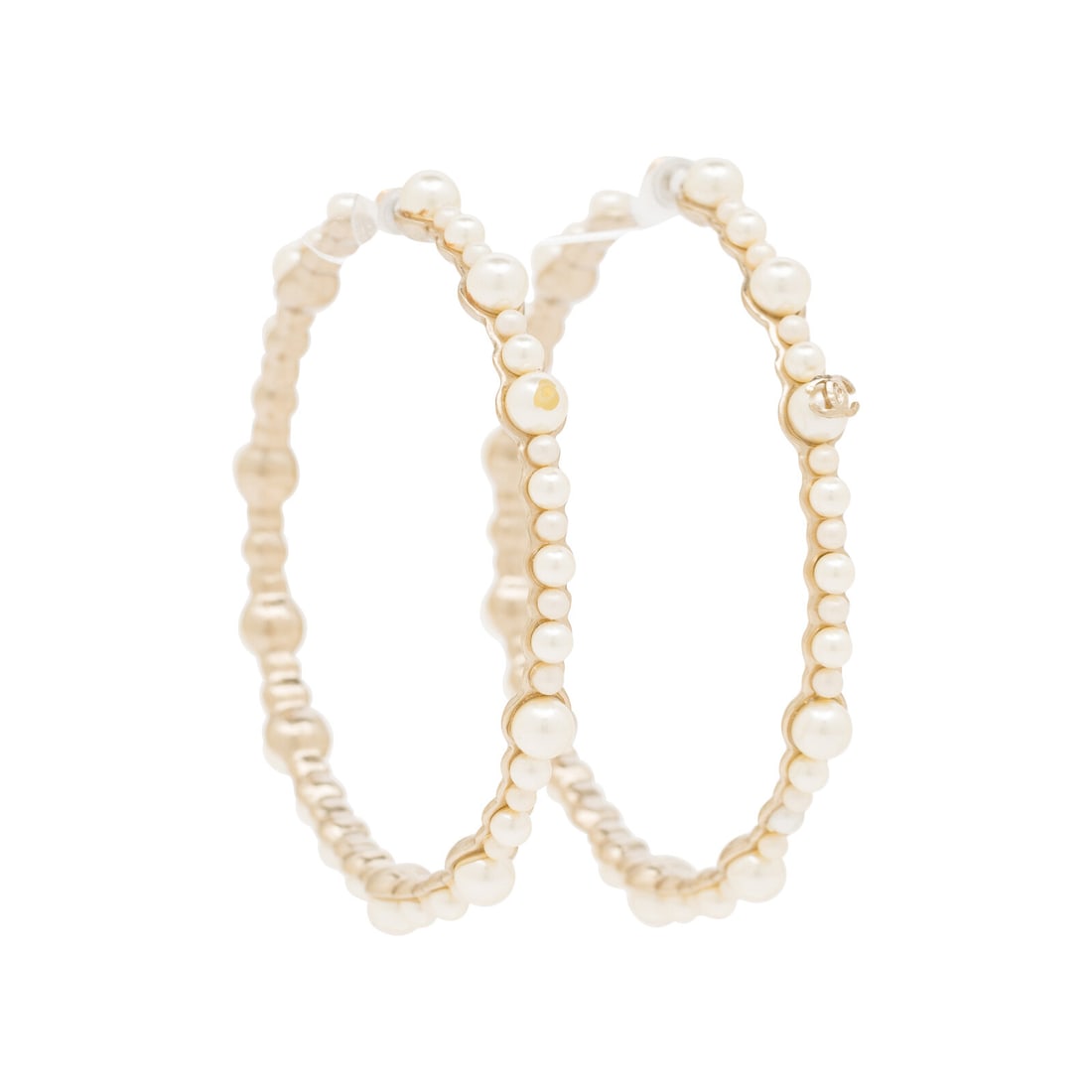 Chanel, Pearl Hoop Earrings: Chanel, Pearl Hoop Earrings Hoop earrings in champagne gold-tone metal with variously sized Gripoix pearl beads. Standard earring post backs. Label: Chanel Date: 2013 Country of Origin: Italy
