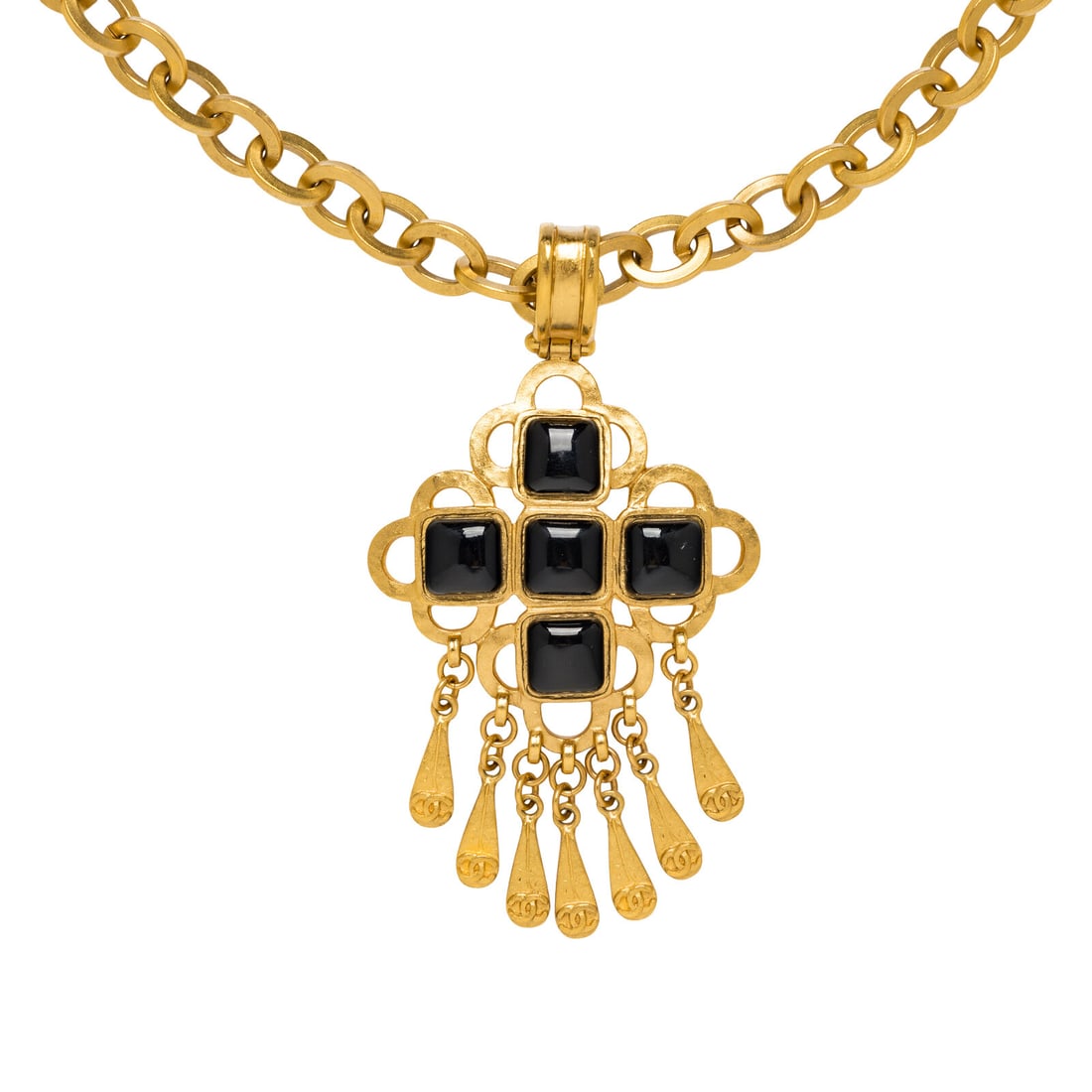 Chanel, Byzantine Cross Logo Pendant Necklace: Chanel, Byzantine Cross Logo Pendant Necklace Pendant necklace in gold-one metal chain, featuring a black glass stone Byzantine cross pendant with dangling metal charms. Spring ring clasp closure.