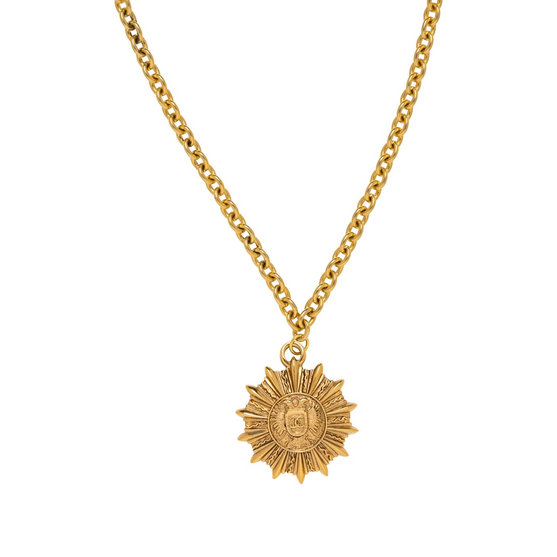 Chanel, Sunburst Pendant Necklace: Chanel, Sunburst Pendant Necklace Sunburst pendant chain necklace in gold-tone metal. Lobster clasp closure. Label: Chanel Date: Late 1980's - Early 1990's Country of Origin: France Approximate Measur
