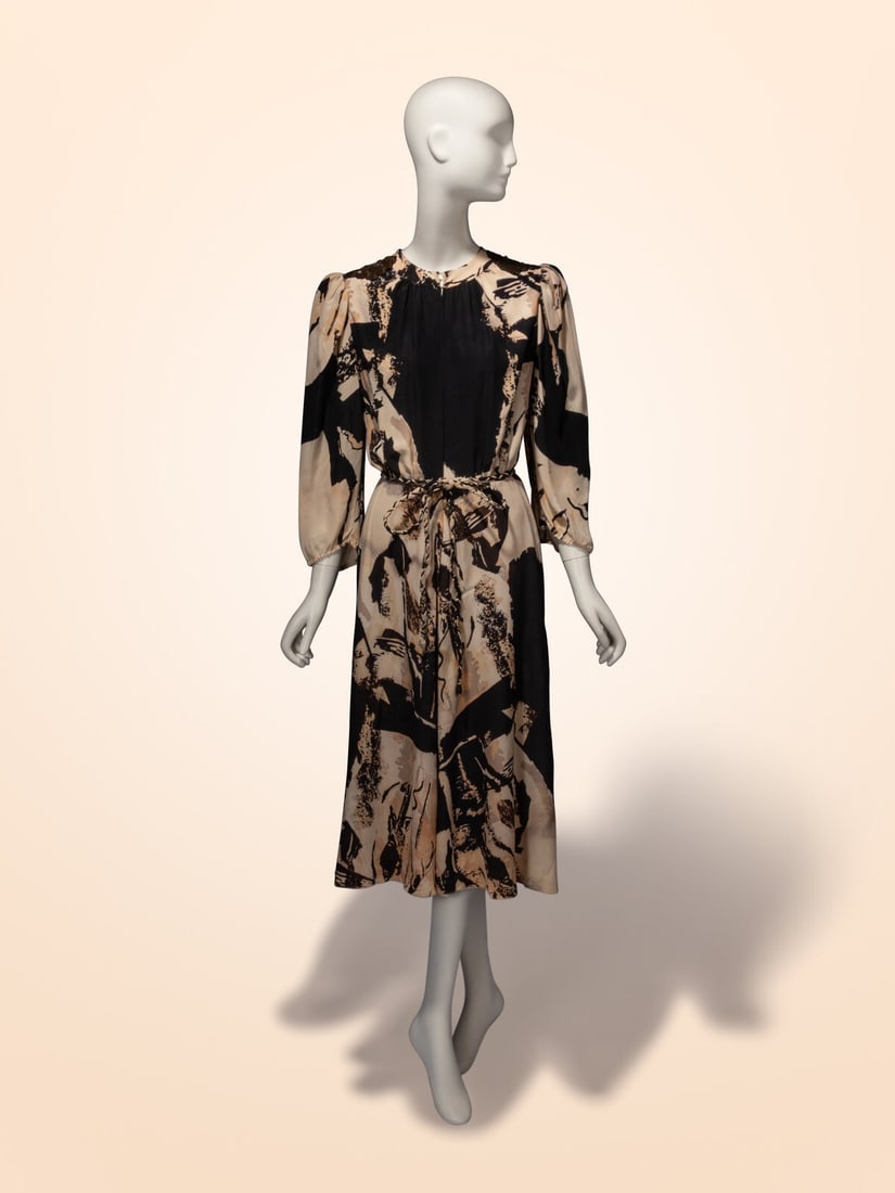 Thea Porter, Abstract Printed Silk Dress: Thea Porter, Abstract Printed Silk Dress Dress in a beige & black abstract-printed silk crÍpe de chine. Flat band collar. Sequin & bead embellished patches at shoulders. Gathering throughout