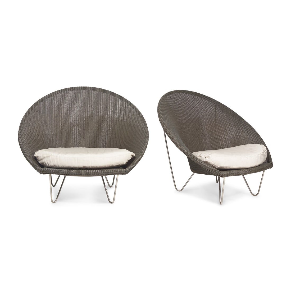 Janus et Cie Modern Design A Pair of Gigi II Outdoor Lounge Chairs: Janus et Cie Modern Design A Pair of Gigi II Outdoor Lounge Chairs synthetic fiber, steel with 'Janus et Cie' soft tag 37 h x 42 1/2 w x 38 1/2 d inches. This lot is located in Philadelphia.