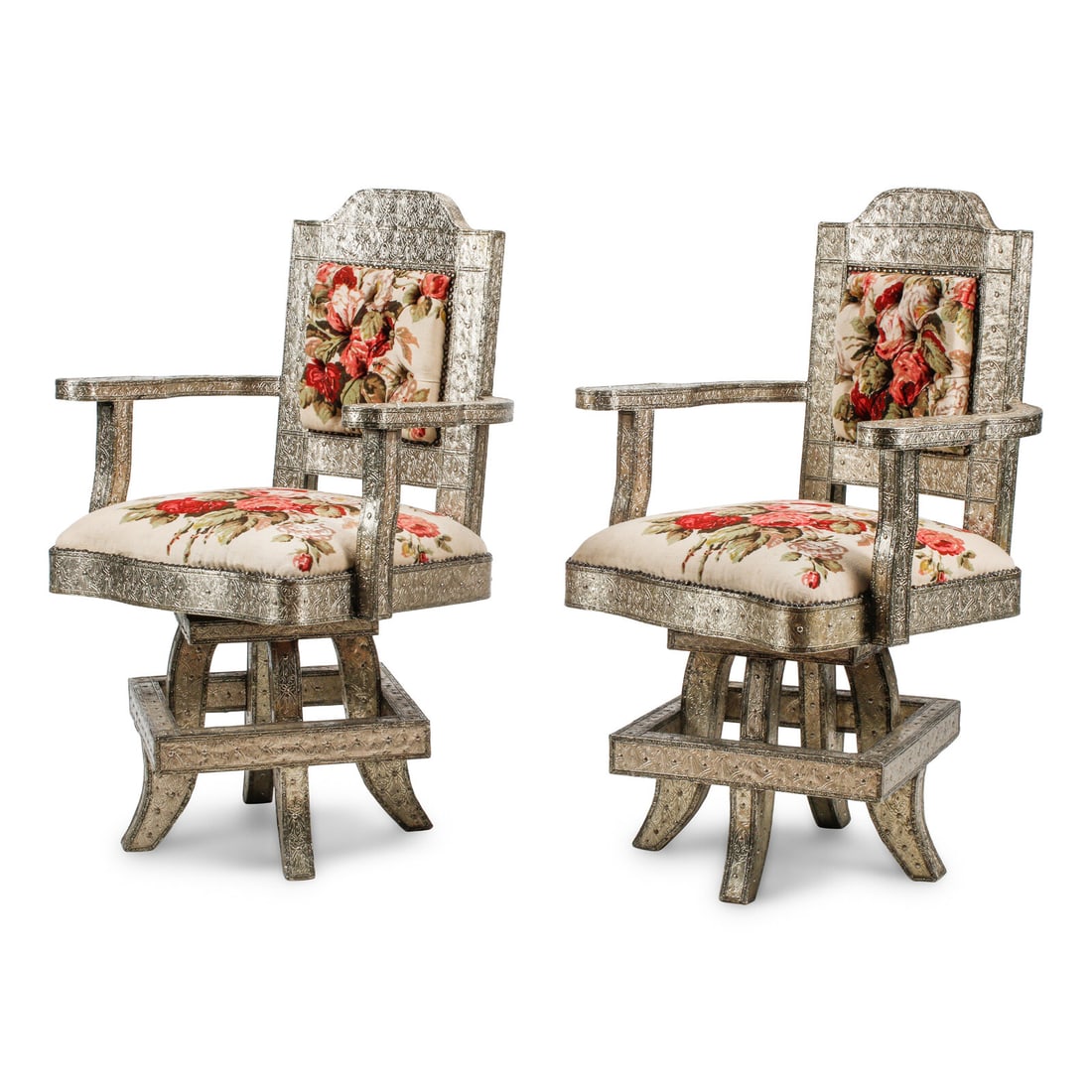 A Pair of Anglo-Colonial Silvered Metal-Clad Swiveling Armchairs (1 of 5)