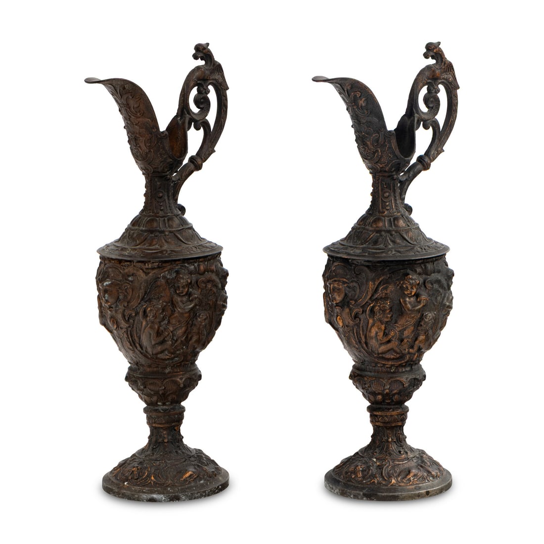A Pair of Neoclassical Cast Metal Ewers: A Pair of Neoclassical Cast Metal Ewers Height 15 1/2 x width 5 x depth 7 inches. This lot is located in Chicago.