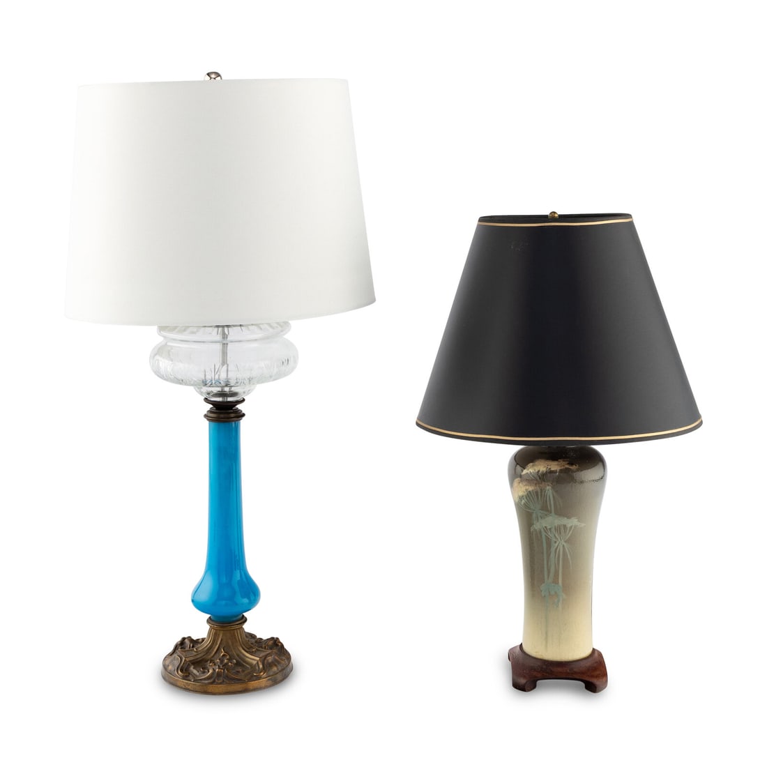 An Opaline Glass Lamp and a Glazed Art Pottery Lamp: An Opaline Glass Lamp and a Glazed Art Pottery Lamp 19th/Early 20th Century the fluid lamp converted to electricity, the pottery lamp drilled and affixed to a base with no visible marks, both with sha
